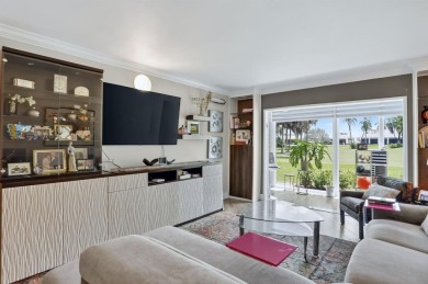 EXQUISITE 1ST FLOOR CORNER IN SOUGHT AFTER ARUBA VILLAGE ON THE on Wynmoor Golf Course in Florida - for sale on GolfHomes.com, golf home, golf lot