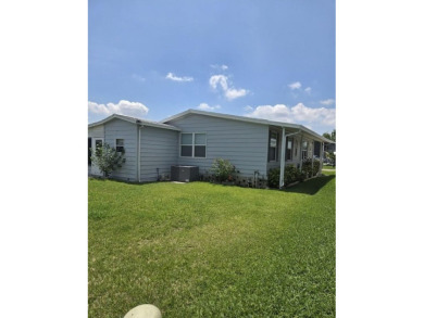Welcome to 407 Dartmouth Dr., Haines City, FL - Florida Living on Sweetwater Golf and Tennis Club in Florida - for sale on GolfHomes.com, golf home, golf lot