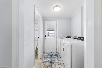 This beautiful lake front home is located in the highly on Glen Eagle Golf and Country Club in Florida - for sale on GolfHomes.com, golf home, golf lot