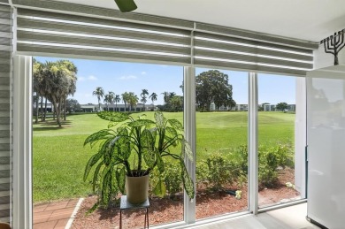 EXQUISITE 1ST FLOOR CORNER IN SOUGHT AFTER ARUBA VILLAGE ON THE on Wynmoor Golf Course in Florida - for sale on GolfHomes.com, golf home, golf lot