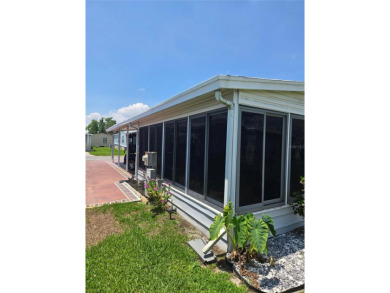 Welcome to 407 Dartmouth Dr., Haines City, FL - Florida Living on Sweetwater Golf and Tennis Club in Florida - for sale on GolfHomes.com, golf home, golf lot
