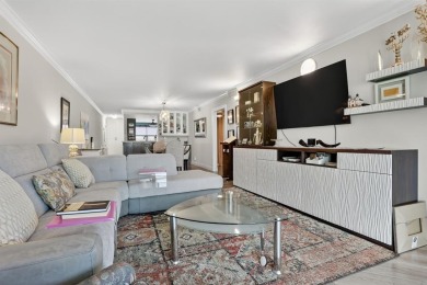 EXQUISITE 1ST FLOOR CORNER IN SOUGHT AFTER ARUBA VILLAGE ON THE on Wynmoor Golf Course in Florida - for sale on GolfHomes.com, golf home, golf lot