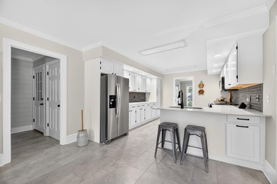 This beautiful brick home is perfectly situated on the scenic on Santee-Cooper Country Club in South Carolina - for sale on GolfHomes.com, golf home, golf lot
