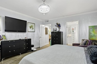 EXQUISITE 1ST FLOOR CORNER IN SOUGHT AFTER ARUBA VILLAGE ON THE on Wynmoor Golf Course in Florida - for sale on GolfHomes.com, golf home, golf lot
