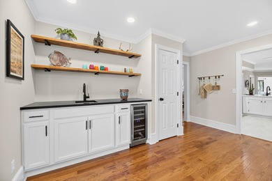 This beautiful brick home is perfectly situated on the scenic on Santee-Cooper Country Club in South Carolina - for sale on GolfHomes.com, golf home, golf lot