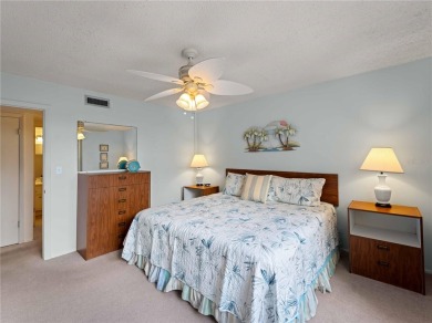 Peaceful water views, two pools, and access to kayak storage on Rotonda Golf and Country Club The Hills Course in Florida - for sale on GolfHomes.com, golf home, golf lot