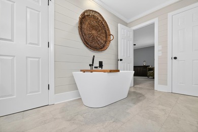 This beautiful brick home is perfectly situated on the scenic on Santee-Cooper Country Club in South Carolina - for sale on GolfHomes.com, golf home, golf lot