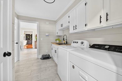 This beautiful brick home is perfectly situated on the scenic on Santee-Cooper Country Club in South Carolina - for sale on GolfHomes.com, golf home, golf lot