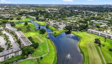 EXQUISITE 1ST FLOOR CORNER IN SOUGHT AFTER ARUBA VILLAGE ON THE on Wynmoor Golf Course in Florida - for sale on GolfHomes.com, golf home, golf lot