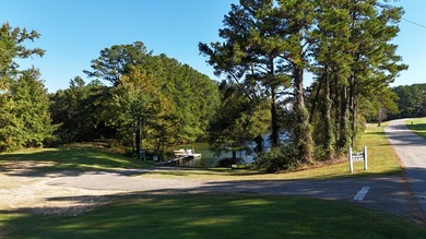 This beautiful brick home is perfectly situated on the scenic on Santee-Cooper Country Club in South Carolina - for sale on GolfHomes.com, golf home, golf lot