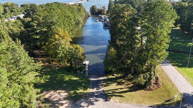 This beautiful brick home is perfectly situated on the scenic on Santee-Cooper Country Club in South Carolina - for sale on GolfHomes.com, golf home, golf lot