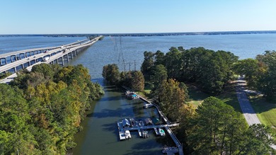 This beautiful brick home is perfectly situated on the scenic on Santee-Cooper Country Club in South Carolina - for sale on GolfHomes.com, golf home, golf lot