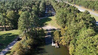 This beautiful brick home is perfectly situated on the scenic on Santee-Cooper Country Club in South Carolina - for sale on GolfHomes.com, golf home, golf lot