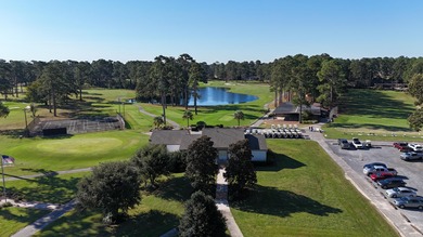 This beautiful brick home is perfectly situated on the scenic on Santee-Cooper Country Club in South Carolina - for sale on GolfHomes.com, golf home, golf lot