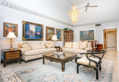 The home is in a gated community inside Doral Estate, surrounded on Doral Golf Resort in Florida - for sale on GolfHomes.com, golf home, golf lot