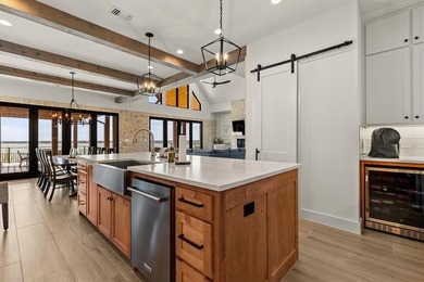 Panoramic Lake Whitney views take center stage in this custom 4 on White Bluff Resort - Old Course in Texas - for sale on GolfHomes.com, golf home, golf lot