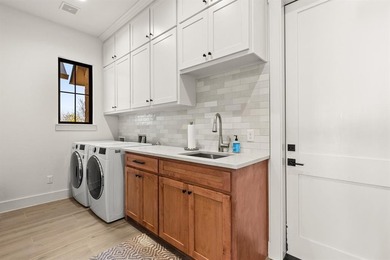 Panoramic Lake Whitney views take center stage in this custom 4 on White Bluff Resort - Old Course in Texas - for sale on GolfHomes.com, golf home, golf lot