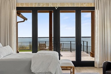 Panoramic Lake Whitney views take center stage in this custom 4 on White Bluff Resort - Old Course in Texas - for sale on GolfHomes.com, golf home, golf lot