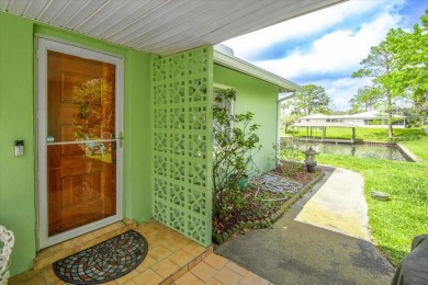 **New Waterfront Handyman Special - Your Dream Canal Home on Palm Harbor Golf Club in Florida - for sale on GolfHomes.com, golf home, golf lot