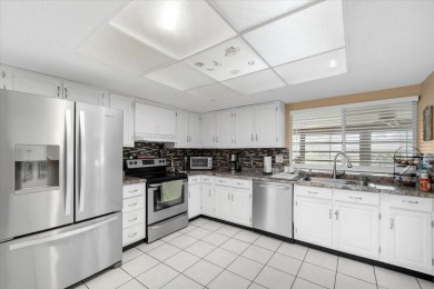 **New Waterfront Handyman Special - Your Dream Canal Home on Palm Harbor Golf Club in Florida - for sale on GolfHomes.com, golf home, golf lot