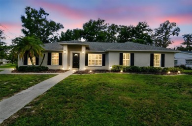 This home is located in the Forest Hills area of Tampa.  It is on Babe Zaharias Golf Course in Florida - for sale on GolfHomes.com, golf home, golf lot
