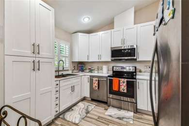 This home is located in the Forest Hills area of Tampa.  It is on Babe Zaharias Golf Course in Florida - for sale on GolfHomes.com, golf home, golf lot