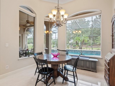 This stunning 4-bedroom, 3-bath pool home overlooking the 16th on DeBary Golf and Country Club in Florida - for sale on GolfHomes.com, golf home, golf lot