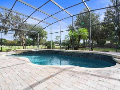 This stunning 4-bedroom, 3-bath pool home overlooking the 16th on DeBary Golf and Country Club in Florida - for sale on GolfHomes.com, golf home, golf lot
