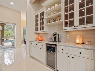 This stunning 4-bedroom, 3-bath pool home overlooking the 16th on DeBary Golf and Country Club in Florida - for sale on GolfHomes.com, golf home, golf lot