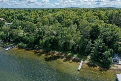 A rare & remarkable opportunity awaits on the shores of Pokegama on Pokegama Golf Course in Minnesota - for sale on GolfHomes.com, golf home, golf lot