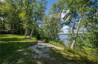 A rare & remarkable opportunity awaits on the shores of Pokegama on Pokegama Golf Course in Minnesota - for sale on GolfHomes.com, golf home, golf lot