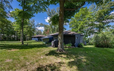 A rare & remarkable opportunity awaits on the shores of Pokegama on Pokegama Golf Course in Minnesota - for sale on GolfHomes.com, golf home, golf lot