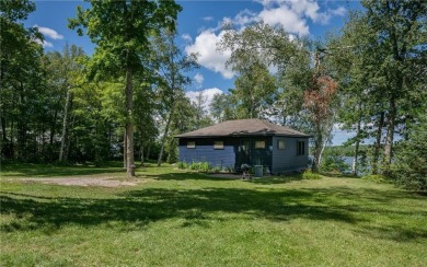 A rare & remarkable opportunity awaits on the shores of Pokegama on Pokegama Golf Course in Minnesota - for sale on GolfHomes.com, golf home, golf lot