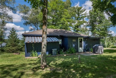 A rare & remarkable opportunity awaits on the shores of Pokegama on Pokegama Golf Course in Minnesota - for sale on GolfHomes.com, golf home, golf lot