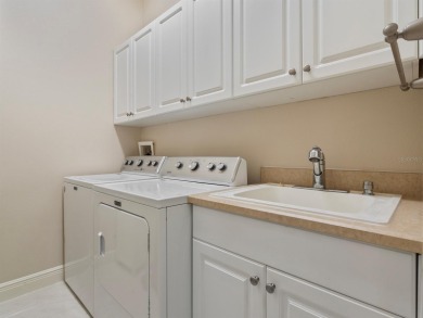This stunning 4-bedroom, 3-bath pool home overlooking the 16th on DeBary Golf and Country Club in Florida - for sale on GolfHomes.com, golf home, golf lot