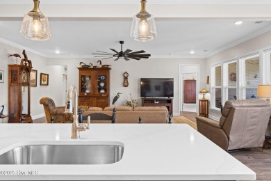 Welcome to this BETTER THAN NEW home in the popular Eagle Run on Crow Creek Golf Club in North Carolina - for sale on GolfHomes.com, golf home, golf lot