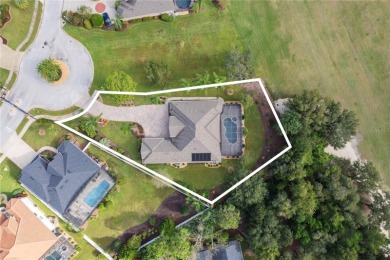 This stunning 4-bedroom, 3-bath pool home overlooking the 16th on DeBary Golf and Country Club in Florida - for sale on GolfHomes.com, golf home, golf lot
