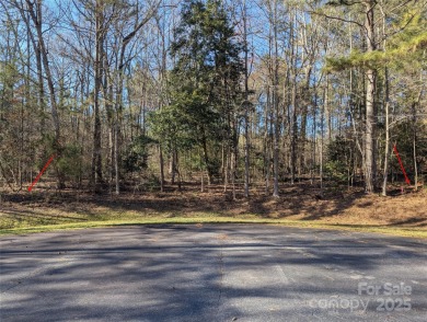 Beautiful cul-de-sac lot in the gated community of Heron Bay on Old North State Club at Uwharrie Point Golf community in North Carolina - for sale on GolfHomes.com, golf home, golf lot