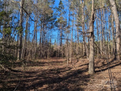 Beautiful cul-de-sac lot in the gated community of Heron Bay on Old North State Club at Uwharrie Point Golf community in North Carolina - for sale on GolfHomes.com, golf home, golf lot