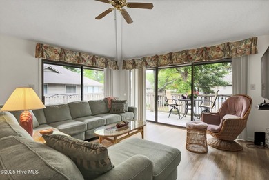 Nestled in the heart of Sunset Beach, this beautifully furnished on Oyster Bay Golf Links in North Carolina - for sale on GolfHomes.com, golf home, golf lot