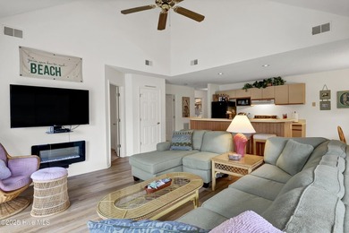 Nestled in the heart of Sunset Beach, this beautifully furnished on Oyster Bay Golf Links in North Carolina - for sale on GolfHomes.com, golf home, golf lot