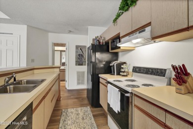 Nestled in the heart of Sunset Beach, this beautifully furnished on Oyster Bay Golf Links in North Carolina - for sale on GolfHomes.com, golf home, golf lot