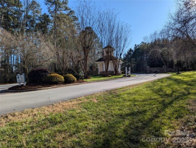 Beautiful cul-de-sac lot in the gated community of Heron Bay on Old North State Club at Uwharrie Point Golf community in North Carolina - for sale on GolfHomes.com, golf home, golf lot