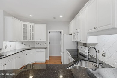 Located on a quiet cul-de-sac in Winding River Plantation, this on Carolina National Golf Club in North Carolina - for sale on GolfHomes.com, golf home, golf lot