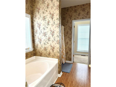 Welcome to this private home tucked in the River North Golf on Canongate At Healy Point Country Club in Georgia - for sale on GolfHomes.com, golf home, golf lot