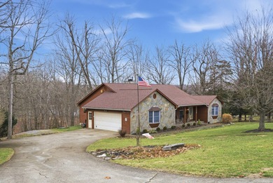 Live the lake life you've always imagined in this one-owner on Peninsula Golf Resort in Kentucky - for sale on GolfHomes.com, golf home, golf lot