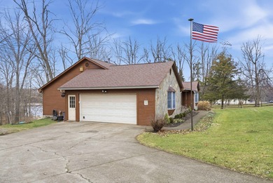Live the lake life you've always imagined in this one-owner on Peninsula Golf Resort in Kentucky - for sale on GolfHomes.com, golf home, golf lot