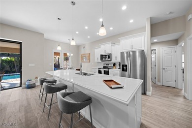 Waterfront Pool Home SW Cape Coral! This newer construction home on Palmetto-Pine Country Club in Florida - for sale on GolfHomes.com, golf home, golf lot