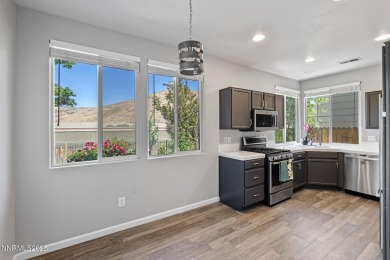 Welcome home to the serene mountain and wetland views in Heron's on Rosewood Lakes Golf Course in Nevada - for sale on GolfHomes.com, golf home, golf lot