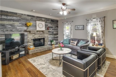 PRICE IMPROVEMENT - WATERFRONT RETREAT - located in the Lake on The Highlands Course at Lake Arrowhead in Georgia - for sale on GolfHomes.com, golf home, golf lot